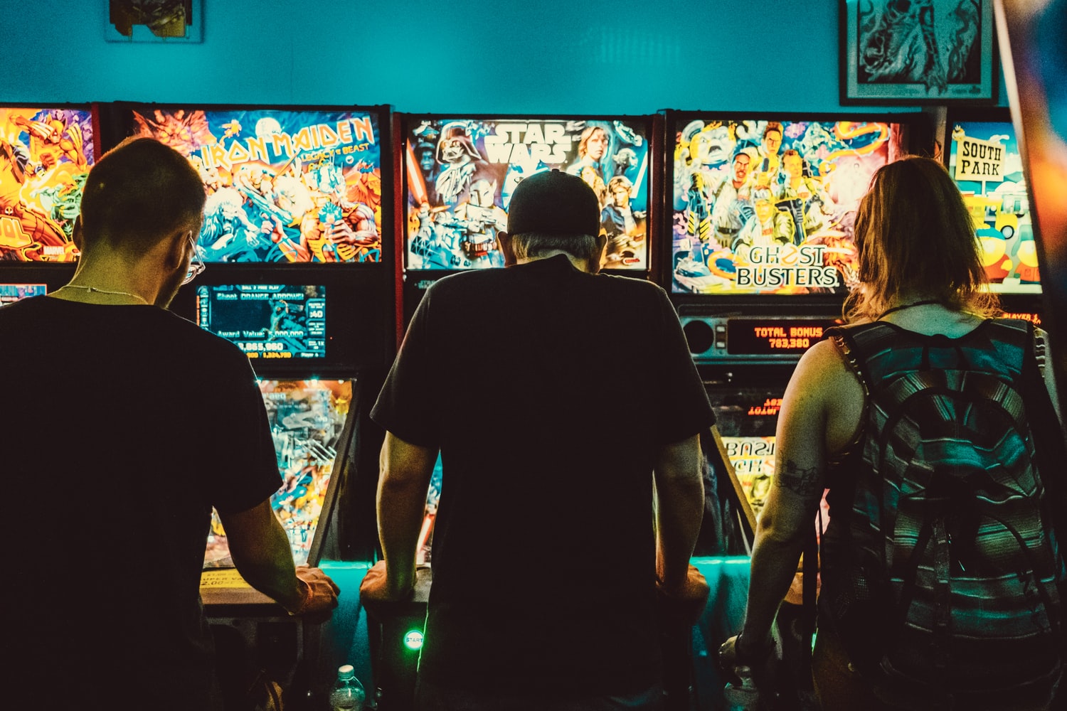 People playing pinball