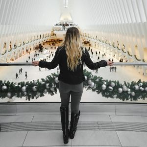 A Woman Standing In Balcony