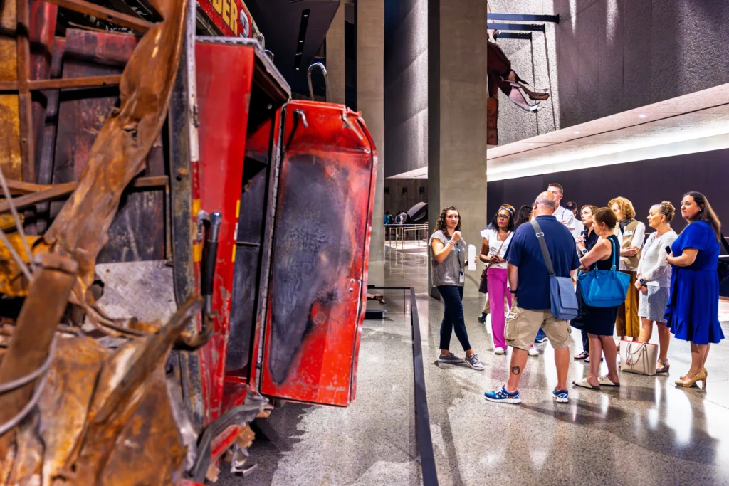 People looking at display in 911 Museum in New York